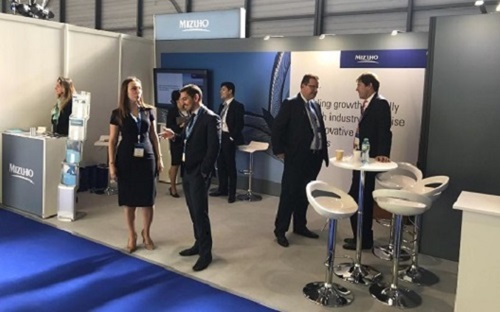 people sitting down at a confence