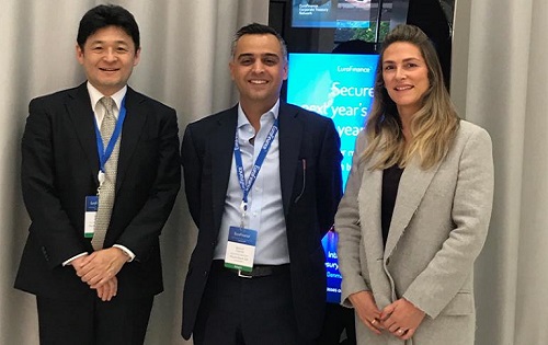 people sitting down at a confence